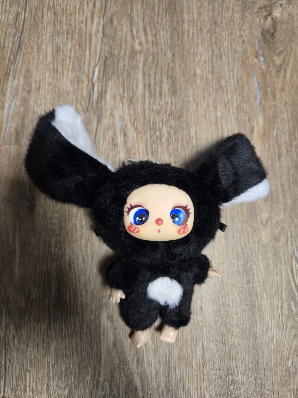 Black Plush Bunny-Look Doll with Bright Blue Eyes